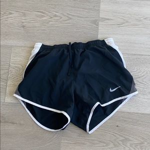 Black Nike running shorts